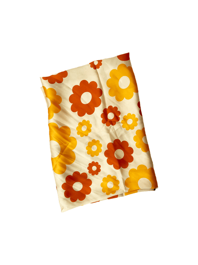 Miribel Naturals Satin Scarf folded to show flower icon..